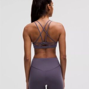 Lululemon Purple Criss-Cross Sports Bra and leggings